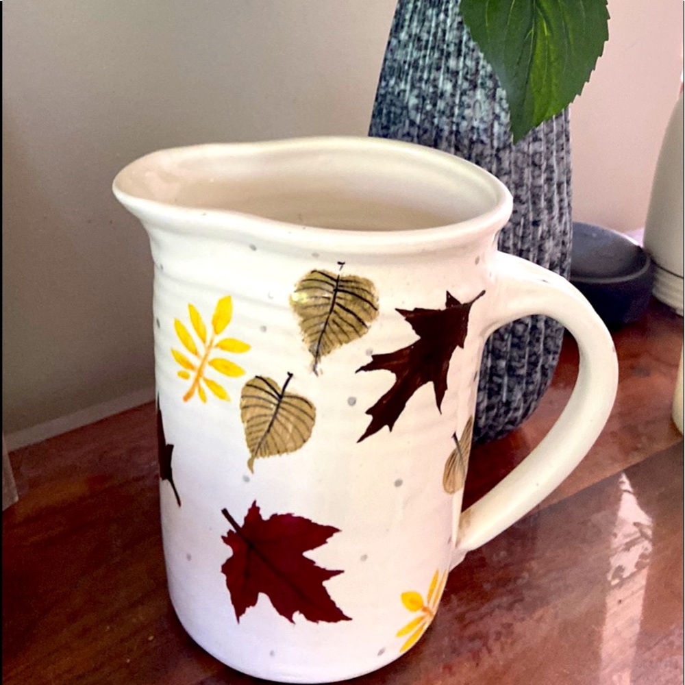 Pottery milk jug